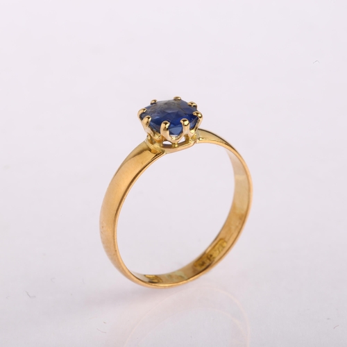 1167 - A mid-19th century solitaire sapphire ring, unmarked high carat gold settings with old-cut sapphire,... 