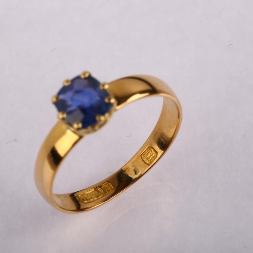 1167 - A mid-19th century solitaire sapphire ring, unmarked high carat gold settings with old-cut sapphire,... 