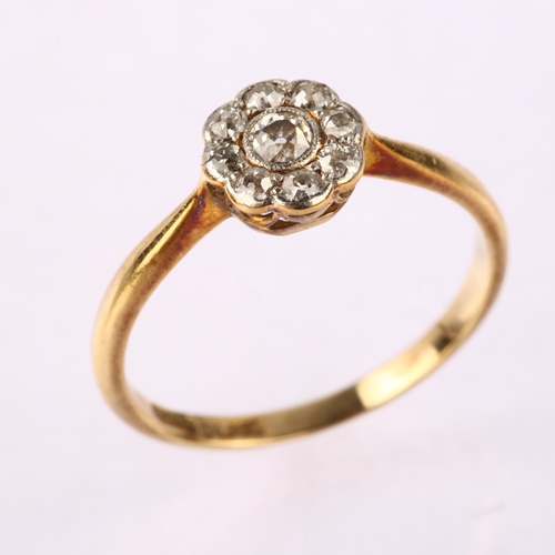 1184 - An 18ct gold diamond flowerhead cluster ring, platinum-topped settings with old European-cut diamond... 