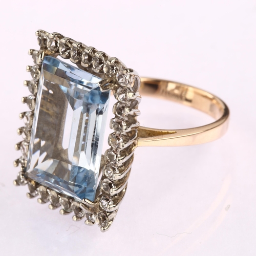 1189 - A large 9ct gold blue and white synthetic spinel rectangular cluster ring, set with rectangular step... 