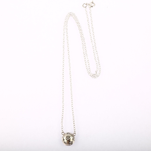 1190 - A modern 9ct white gold diamond bombe pendant necklace, set with modern round brilliant-cut diamonds... 