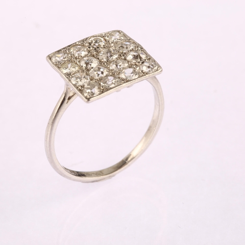 1191 - An Art Deco platinum diamond square cluster panel ring, pave set with old European-cut diamonds, tot... 