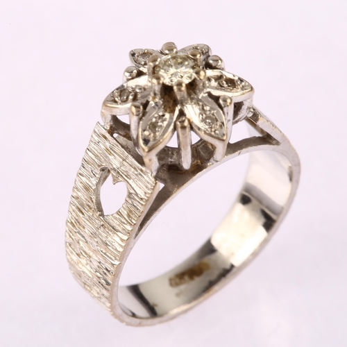 1193 - A mid-20th century 18ct white gold diamond flowerhead cluster ring, set with modern round brilliant ... 