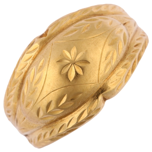 1195 - A late 20th century Continental gold bombe ring, with engraved floral decoration, setting height 11.... 