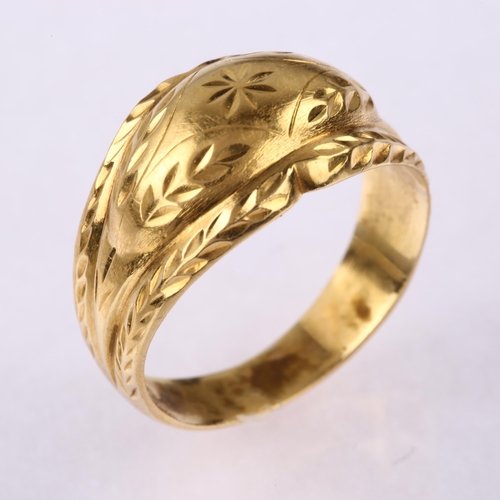 1195 - A late 20th century Continental gold bombe ring, with engraved floral decoration, setting height 11.... 