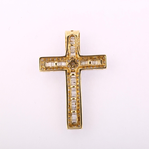 1202 - A modern 9ct gold diamond cross pendant, set with modern round brilliant baguette and single-cut dia... 