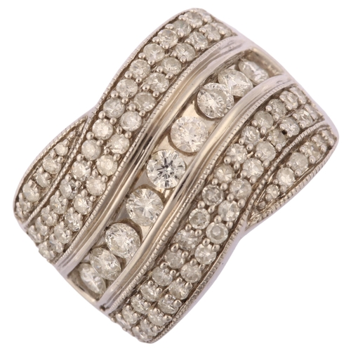 1203 - A large modern 18ct white gold diamond band ring, set with modern round brilliant and single-cut dia... 