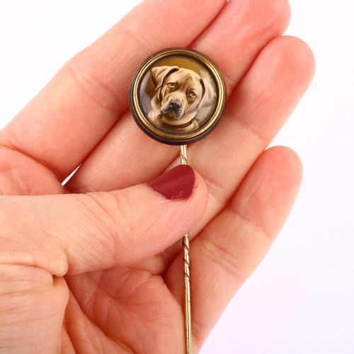 1206 - A Victorian hand painted enamelled dog stickpin, unmarked yellow metal settings with circular enamel... 