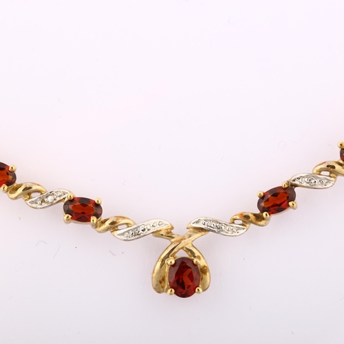 1208 - A 9ct gold garnet and diamond necklace, length 40cm, 6g