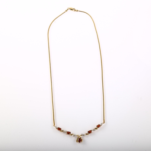 1208 - A 9ct gold garnet and diamond necklace, length 40cm, 6g