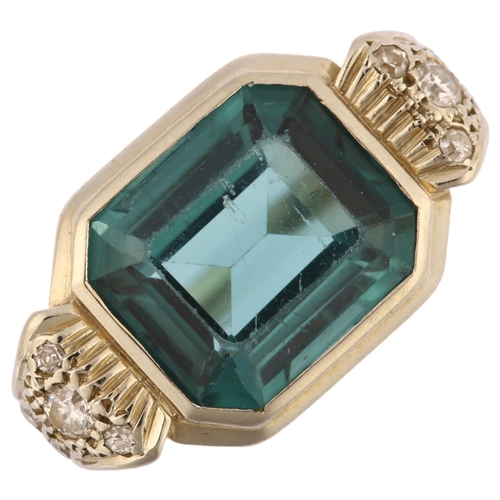 1211 - An 18ct white gold indicolite tourmaline and diamond cocktail ring, set with octagonal step-cut tour... 