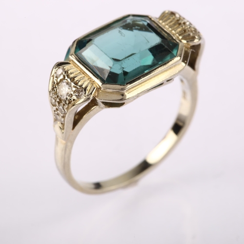 1211 - An 18ct white gold indicolite tourmaline and diamond cocktail ring, set with octagonal step-cut tour... 