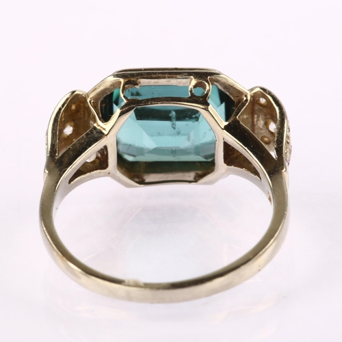 1211 - An 18ct white gold indicolite tourmaline and diamond cocktail ring, set with octagonal step-cut tour... 