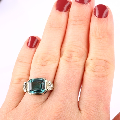 1211 - An 18ct white gold indicolite tourmaline and diamond cocktail ring, set with octagonal step-cut tour... 