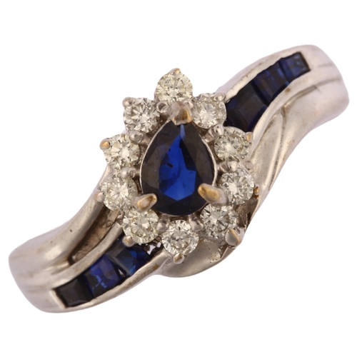 1213 - A modern 9ct white gold sapphire and diamond pear cluster crossover ring, total diamond content appr... 