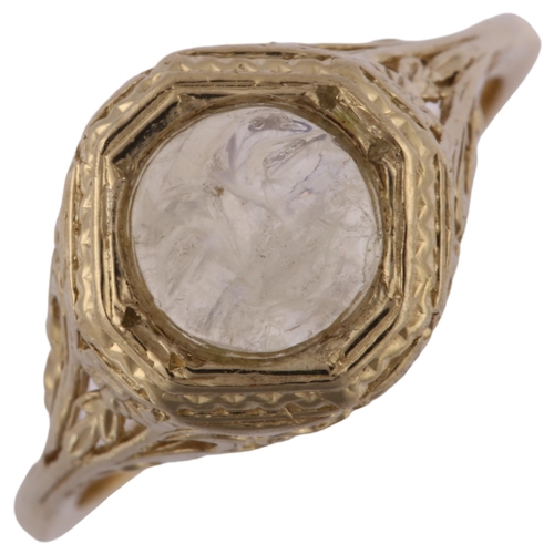 1217 - An Art Deco moonstone 'man in the moon' ring, unmarked gold settings with octagonal head and pierced... 