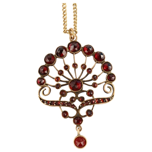 1218 - A Bohemian garnet floral pendant necklace, unmarked yellow metal closed-back settings, set with face... 