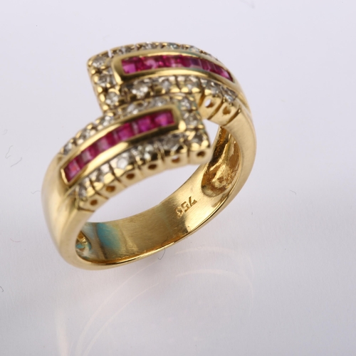 1224 - A modern 18ct gold ruby and diamond crossover ring, set with calibre-cut rubies and single-cut diamo... 