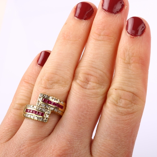 1224 - A modern 18ct gold ruby and diamond crossover ring, set with calibre-cut rubies and single-cut diamo... 