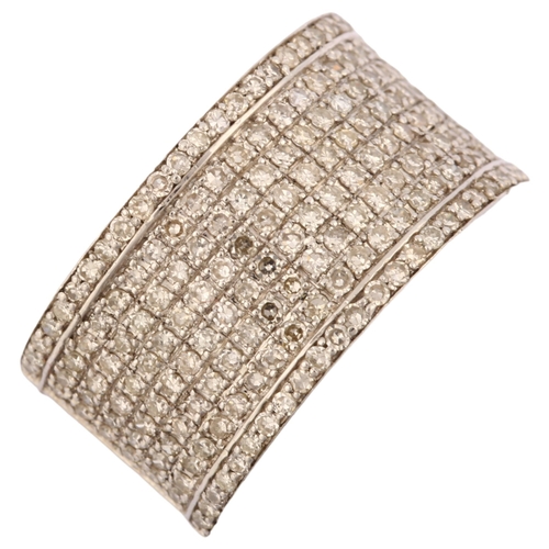 1226 - A large modern 18ct white gold diamond band ring, pave set with single-cut diamonds, total diamond c... 