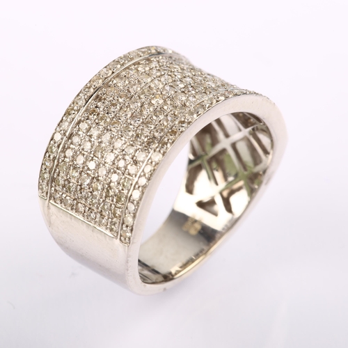 1226 - A large modern 18ct white gold diamond band ring, pave set with single-cut diamonds, total diamond c... 