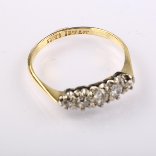 1228 - An 18ct gold graduated five stone diamond ring, platinum-topped set with old-cut diamonds, total dia... 