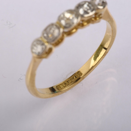 1229 - An 18ct gold graduated five stone diamond ring, bezel set with old-cut diamonds, total diamond conte... 