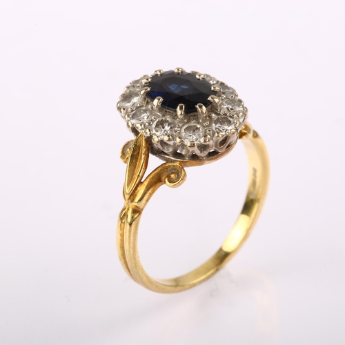 1230 - An 18ct gold sapphire and diamond oval cluster ring, set with oval mixed-cut sapphire and modern rou... 