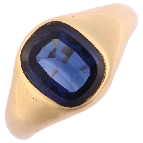 1231 - A 14ct gold synthetic sapphire signet ring, set with oval table-cut sapphire, sapphire measures: 9.7... 