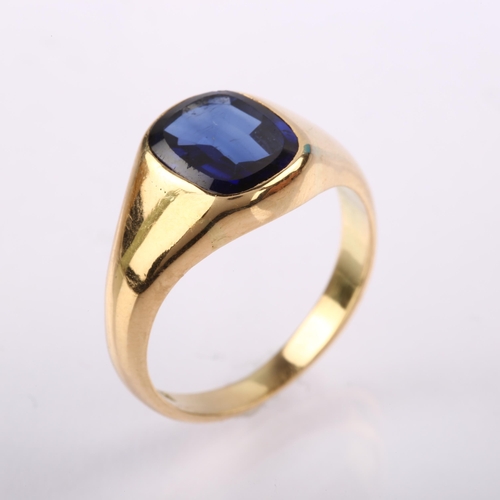 1231 - A 14ct gold synthetic sapphire signet ring, set with oval table-cut sapphire, sapphire measures: 9.7... 