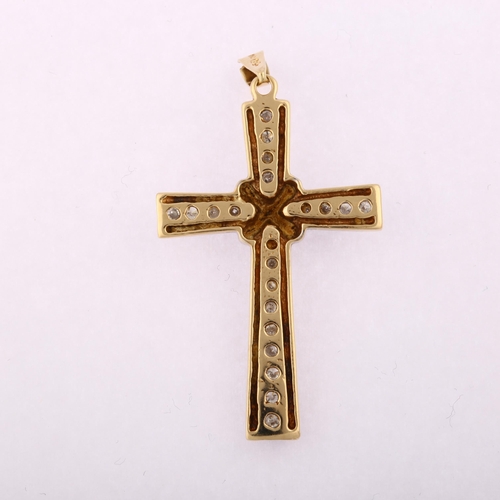 1234 - A modern 9ct gold diamond cross pendant, set with modern round brilliant-cut diamonds, total diamond... 