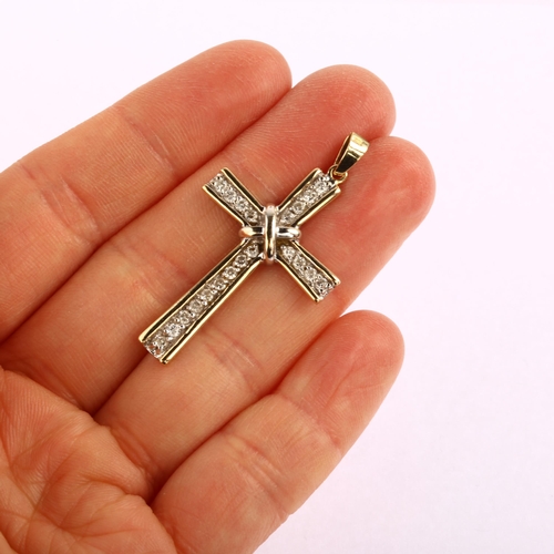 1234 - A modern 9ct gold diamond cross pendant, set with modern round brilliant-cut diamonds, total diamond... 