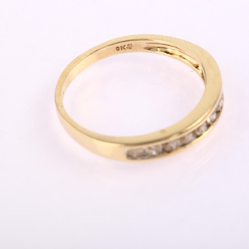 1235 - A modern 9ct gold diamond half eternity ring, channel set with modern round brilliant-cut diamonds, ... 