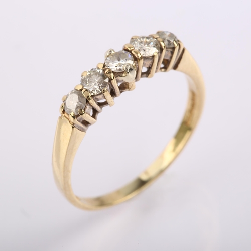 1268 - A modern 9ct gold five stone diamond ring, prong set with modern round brilliant-cut diamonds, total... 