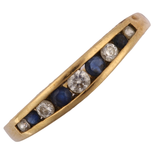 1276 - A modern 9ct gold sapphire and cubic zirconia half eternity ring, channel set with modern round bril... 