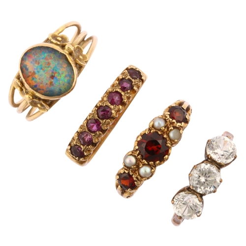 1285 - Various rings, including 2 x 9ct gold garnet rings (6.2g), Middle Eastern opal triplet ring (3.8g), ... 