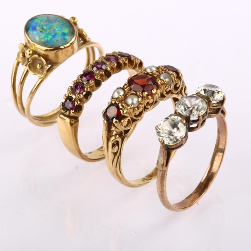 1285 - Various rings, including 2 x 9ct gold garnet rings (6.2g), Middle Eastern opal triplet ring (3.8g), ... 