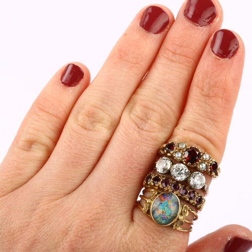 1285 - Various rings, including 2 x 9ct gold garnet rings (6.2g), Middle Eastern opal triplet ring (3.8g), ... 