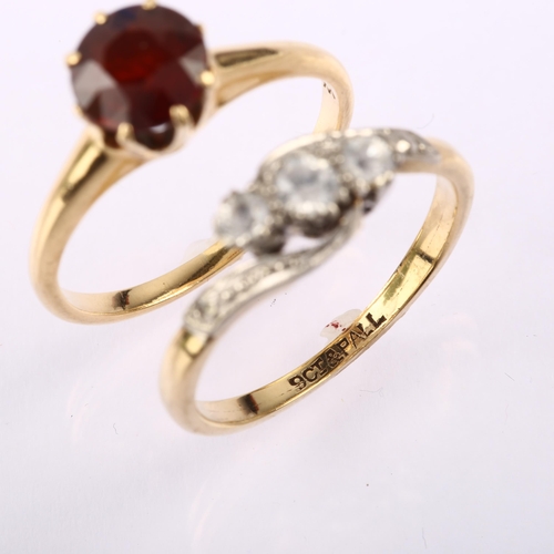 1287 - A 14ct gold solitaire garnet ring, size P, 3.3g, and a 9ct gold white sapphire crossover ring, size ... 