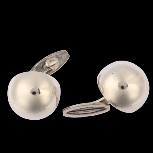 1301 - HANS HANSEN - a pair of Danish modernist sterling silver bombe cufflinks, model no. 641, panel diame... 