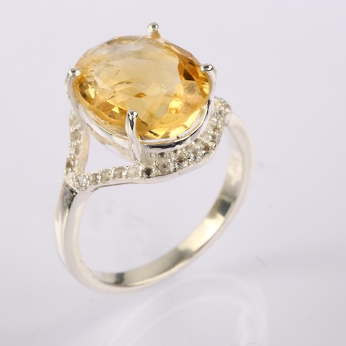 1304 - A modern sterling silver citrine and white topaz cluster ring, set with 7ct oval mixed-cut citrine, ... 