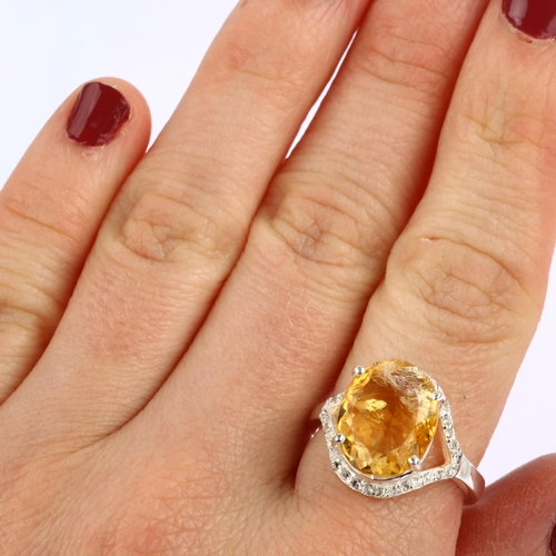 1304 - A modern sterling silver citrine and white topaz cluster ring, set with 7ct oval mixed-cut citrine, ... 