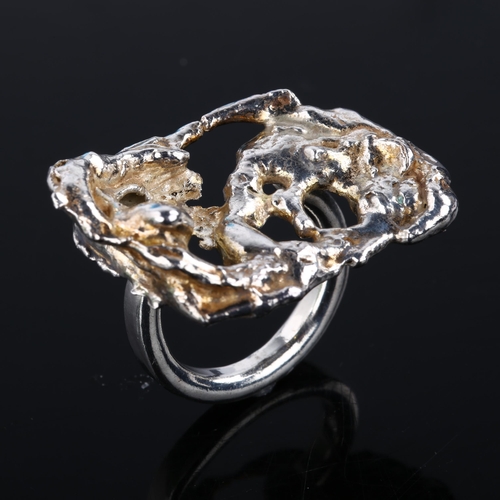 1306 - A large Danish brutalist abstract ring, unmarked white metal settings, setting height 25.5mm, size a... 