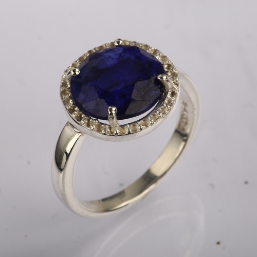 1308 - A modern sterling silver sapphire and white topaz cluster ring, set with 4ct African sapphire, setti... 