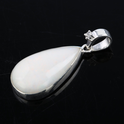 1311 - A modern sterling silver opal and white topaz drop pendant, set with pear cabochon Ethiopian noble o... 