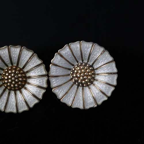 1318 - ANTON MICHELSEN - a pair of Danish vermeil sterling silver and white enamel daisy pattern clip-on ea... 