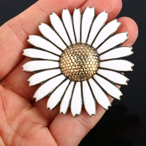 1322 - VIGGO PEDERSEN - a large Danish vermeil sterling silver and white enamel daisy pattern brooch, diame... 