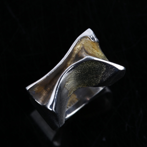 1332 - BJORN WECKSTROM for LAPPONIA - a Finnish modernist sterling silver and silver-gilt abstract fold rin... 