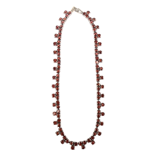 1337 - A modern sterling silver garnet fringe necklace, length 44cm, 68.4g