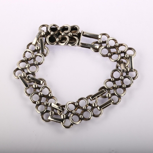 1340 - ANNE MARIE SERRITSLEV - an Art Deco Danish silver geometric panel bracelet, length 19.5cm, 27g